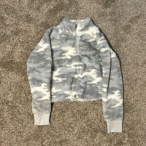 Medium, grey camo, cropped quarter zip from Calvin Klein.